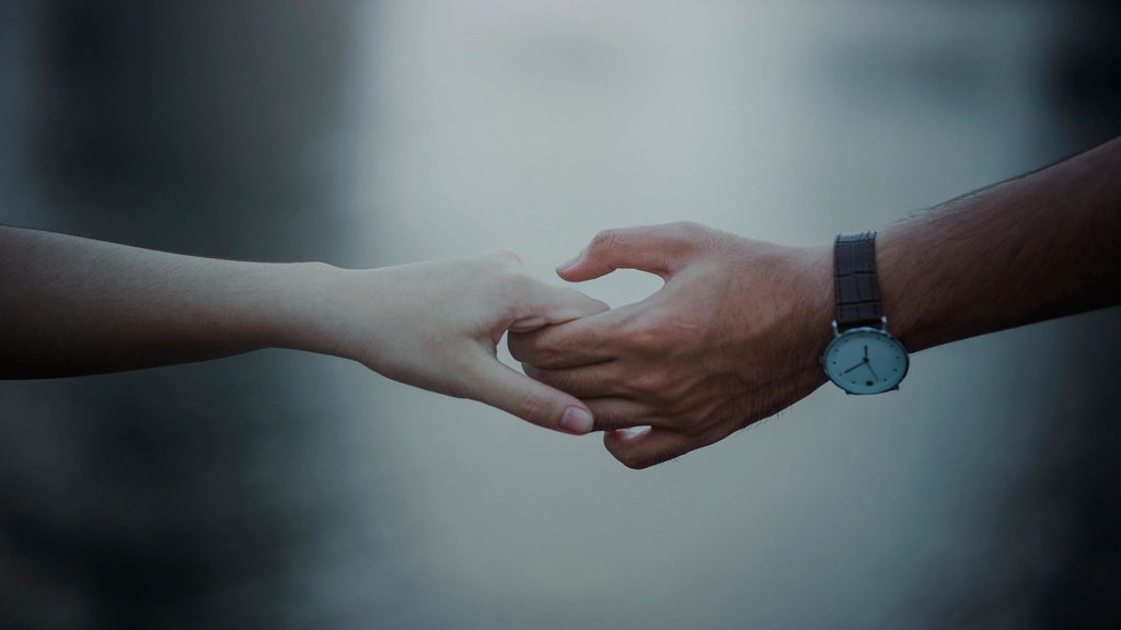 couple holding hands